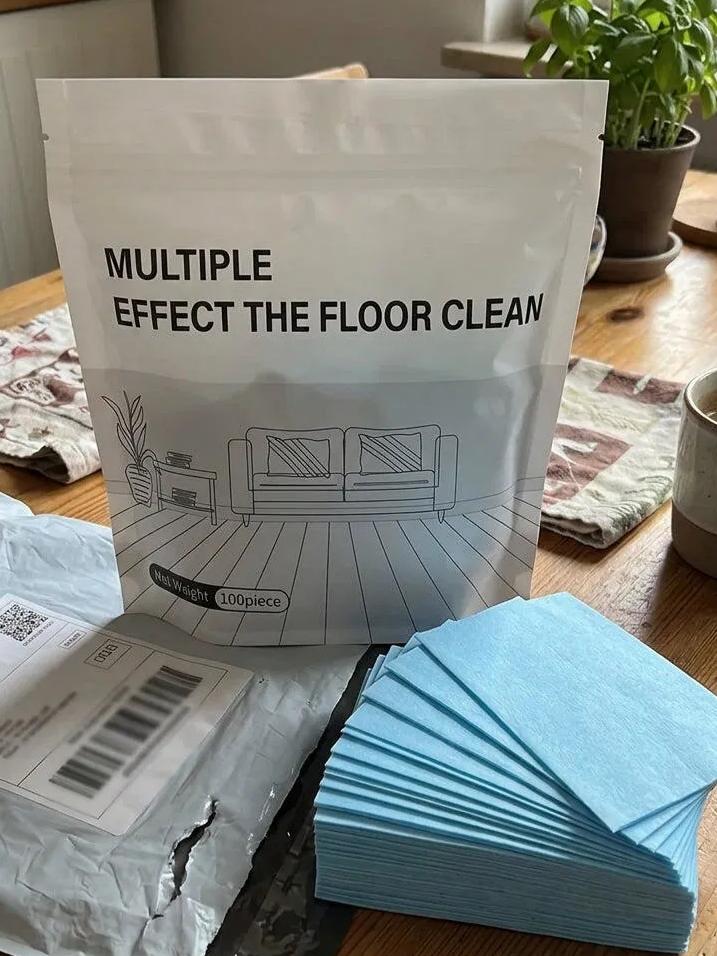 Customer holding the product package and blue cleaning sheets